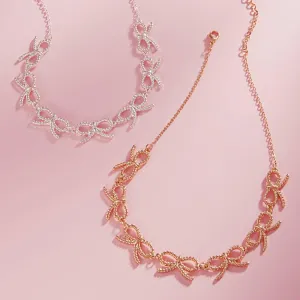 Linked Bows Gold Charm Necklaces